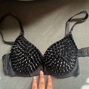 Bra with black spikes on it